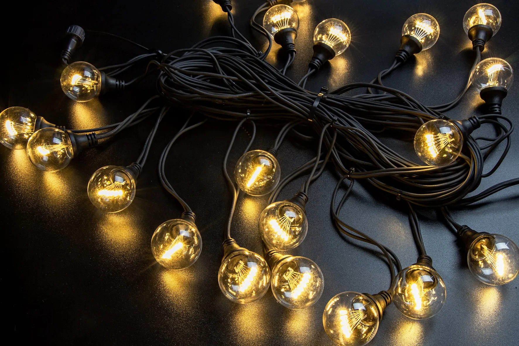 картинка Гирлянда Винтаж, 220В, черная резина, теплый белый