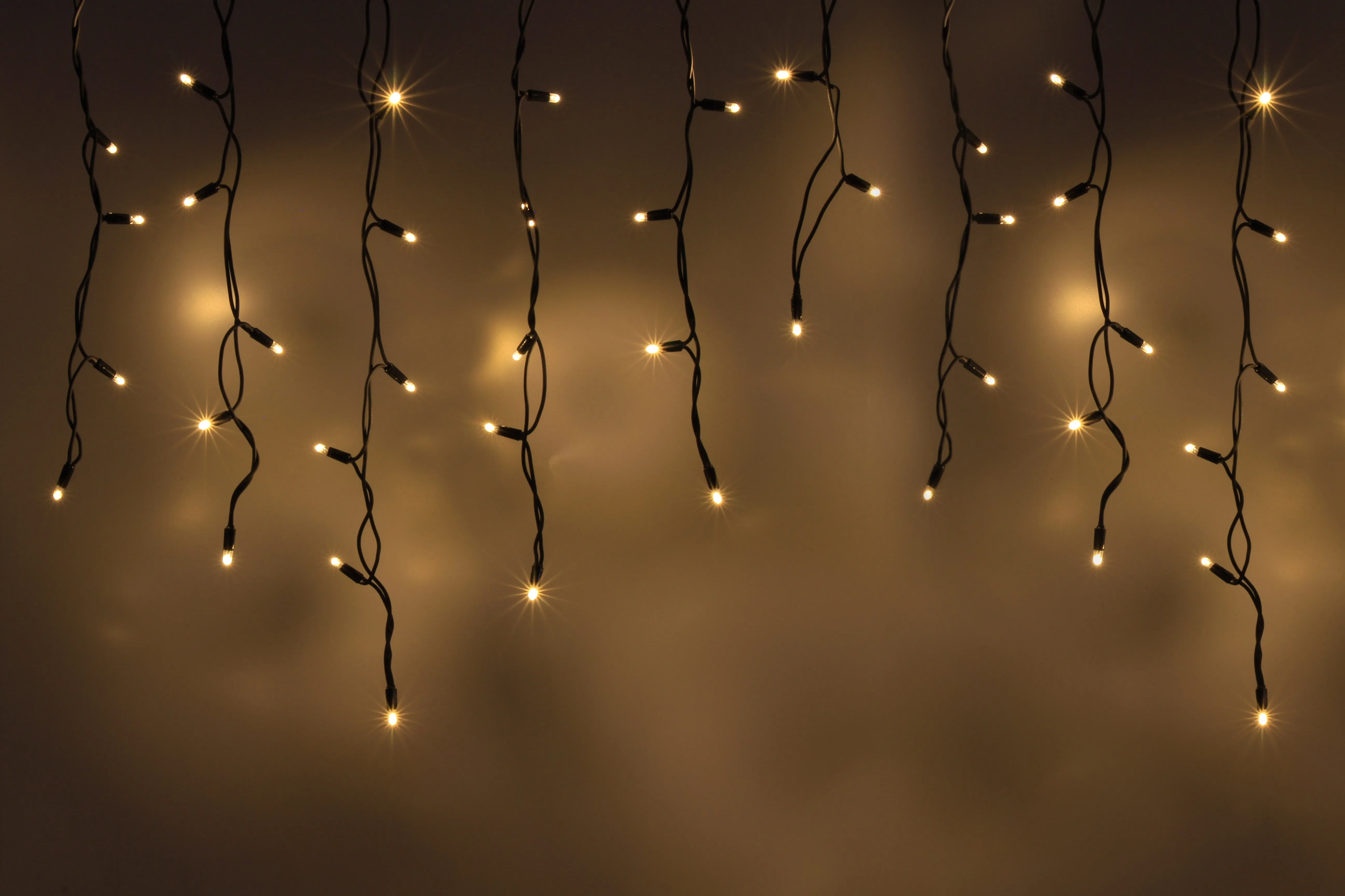 картинка Светодиодная бахрома 3х0.6м, статика, черный провод, теплая белая